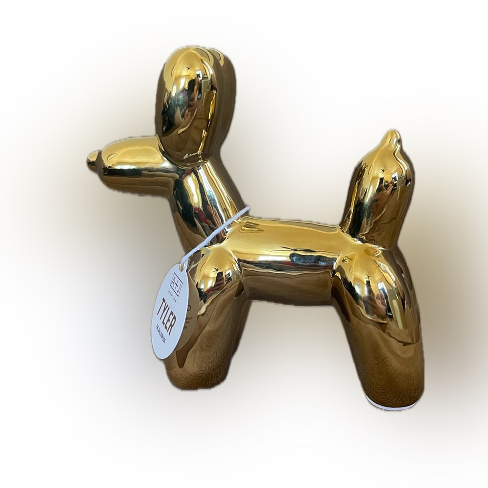 Gold Figure dog in the form of balloon’s